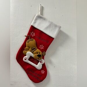 Dog Christmas stocking holds a picture too